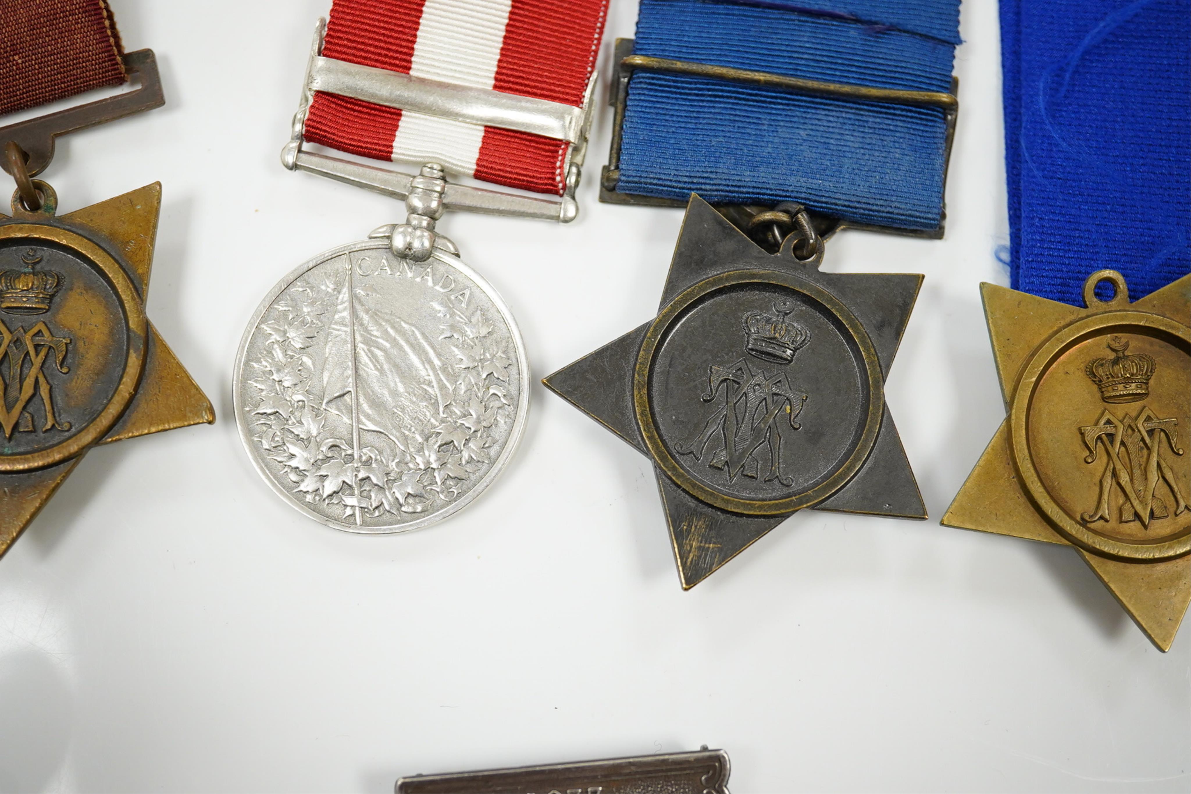 Five replica medals; Khedive's Star 1882, another undated with clasp and a third, 1884 lacking bar, Canada General Service with Fentan Raid 1866 clasp and South Africa medal with 1877-8-9 clasp and a spare 1877 clasp.